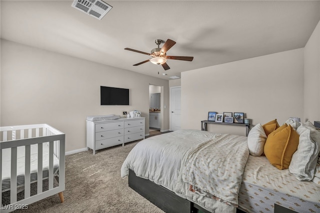 bedroom featuring visible vents, baseboards, carpet, and a ceiling fan