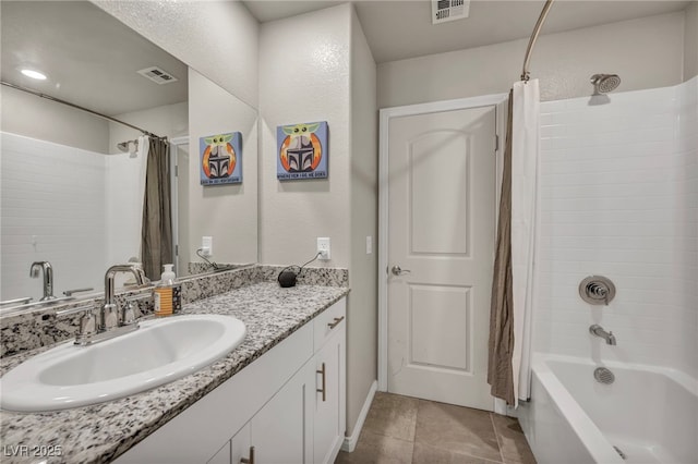 bathroom featuring tile patterned flooring, shower / bath combination with curtain, vanity, and visible vents