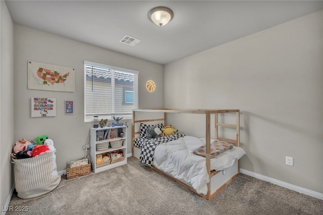 bedroom featuring visible vents, baseboards, and carpet