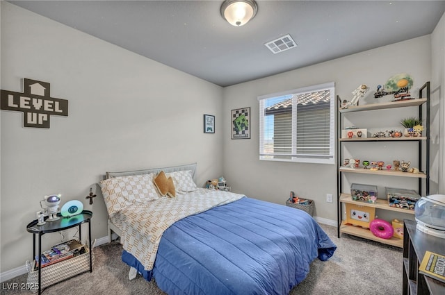 bedroom featuring carpet flooring, baseboards, and visible vents