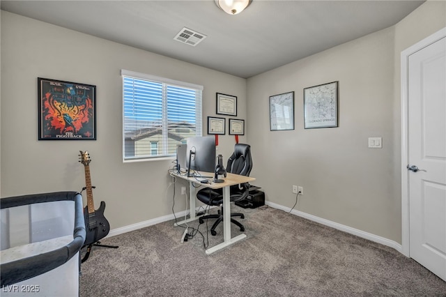 office with baseboards, visible vents, and carpet floors