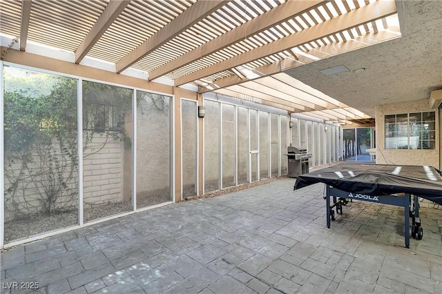 exterior space with outdoor dining space, area for grilling, and a pergola