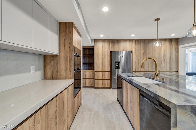 kitchen with a sink, dishwashing machine, modern cabinets, and stainless steel fridge with ice dispenser