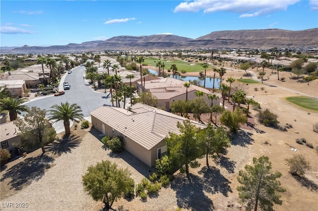 4963 Pensier St, Las Vegas, NV 89135 - bird's eye view featuring view of golf course, a residential view, and a water and mountain view