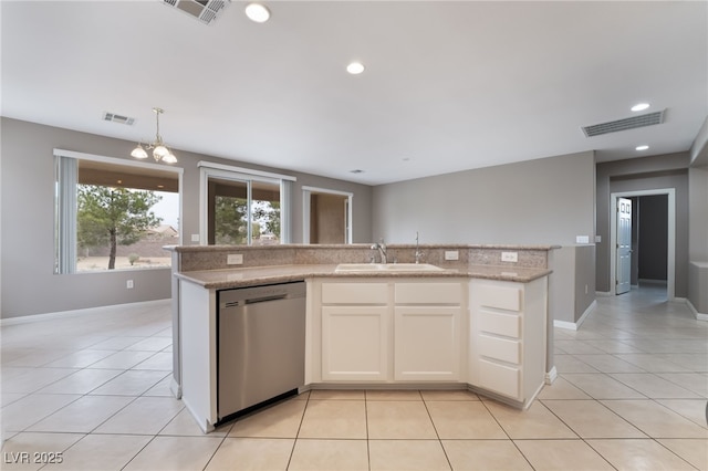 4963 Pensier St, Las Vegas, NV 89135 - kitchen with a sink, stainless steel dishwasher, light tile patterned floors, and visible vents