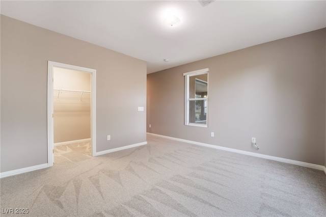 4963 Pensier St, Las Vegas, NV 89135 - empty room featuring light carpet and baseboards