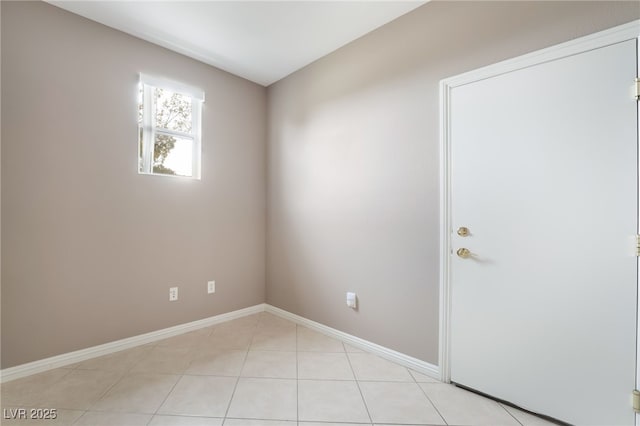 4963 Pensier St, Las Vegas, NV 89135 - spare room with light tile patterned flooring and baseboards