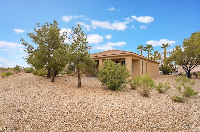 4963 Pensier St, Las Vegas, NV 89135 - exterior space with stucco siding