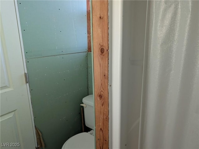 bathroom featuring toilet