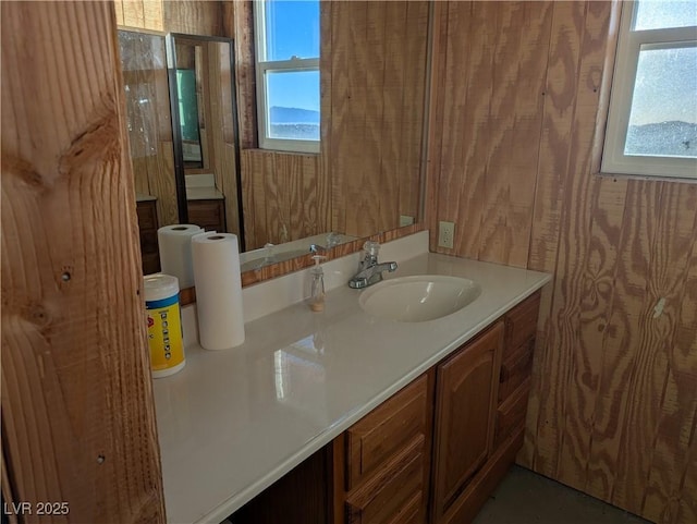 bathroom with vanity and a wealth of natural light