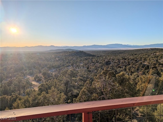 mountain view featuring a view of trees