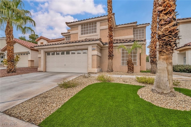 mediterranean / spanish-style house with a tiled roof, a garage, driveway, and stucco siding