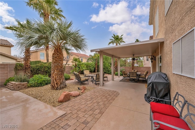 view of patio / terrace featuring a grill, outdoor dining area, and a fenced backyard