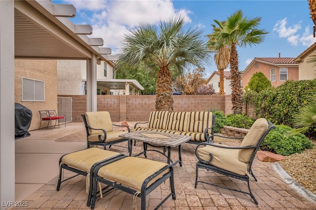 view of patio featuring a fenced backyard and grilling area