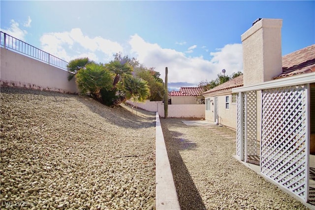 view of yard featuring fence