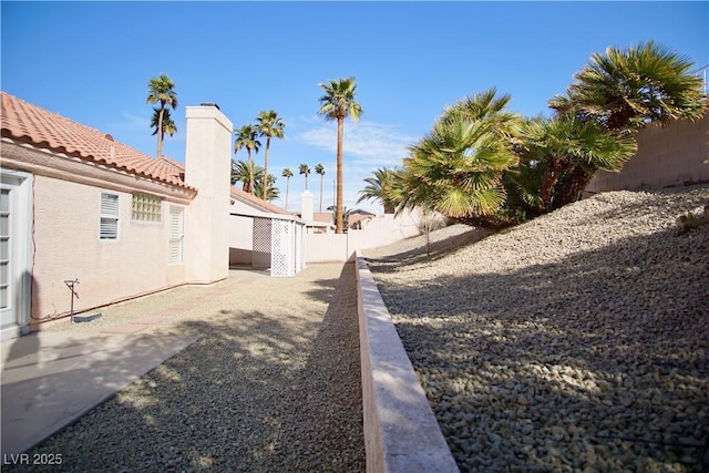 view of yard featuring a patio and a fenced backyard