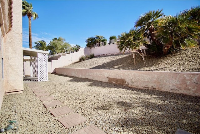 view of yard with fence