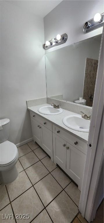 510 Holick Ave, Henderson, NV 89011 - bathroom with double vanity and tile patterned flooring