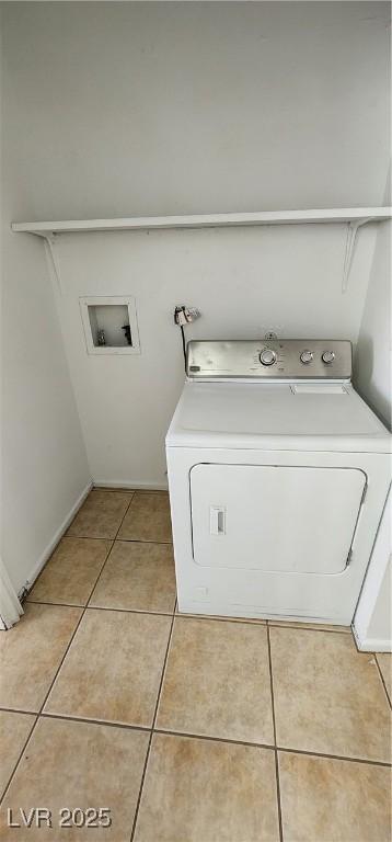 510 Holick Ave, Henderson, NV 89011 - washroom featuring washer / dryer and light tile patterned flooring
