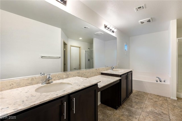 bathroom with vanity, visible vents, a shower stall, tile patterned floors, and a bath