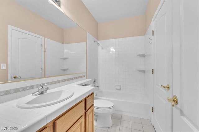 full bath with bathtub / shower combination, tile patterned floors, toilet, and vanity