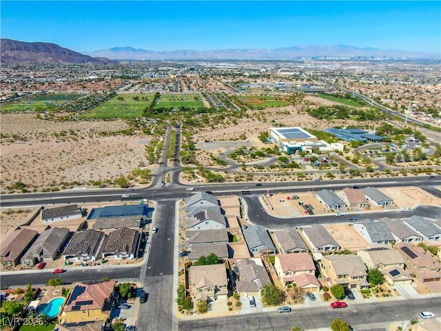 bird's eye view with a mountain view