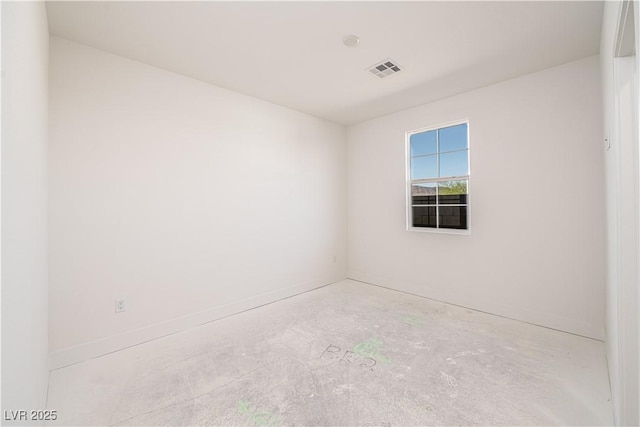 unfurnished room with visible vents and unfinished concrete flooring