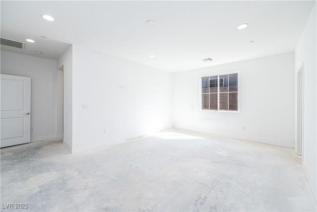 spare room with recessed lighting, visible vents, concrete floors, and baseboards