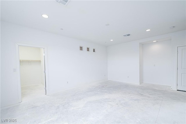 unfurnished room featuring visible vents and recessed lighting