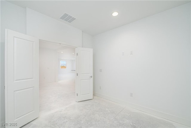 spare room with recessed lighting, visible vents, unfinished concrete flooring, and baseboards