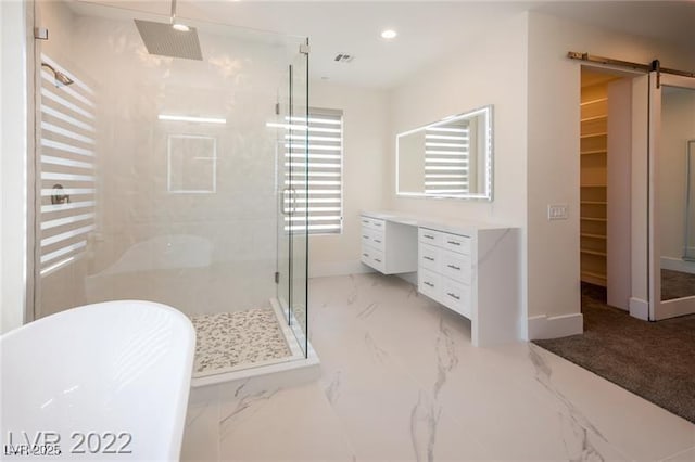 full bathroom with baseboards, recessed lighting, a freestanding bath, a shower stall, and marble finish floor