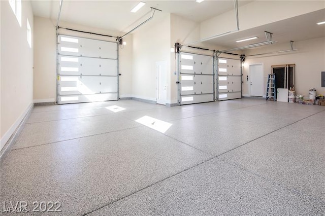 garage with baseboards