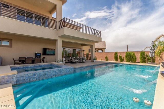 view of swimming pool with fence, a patio, a fenced in pool, a ceiling fan, and an in ground hot tub