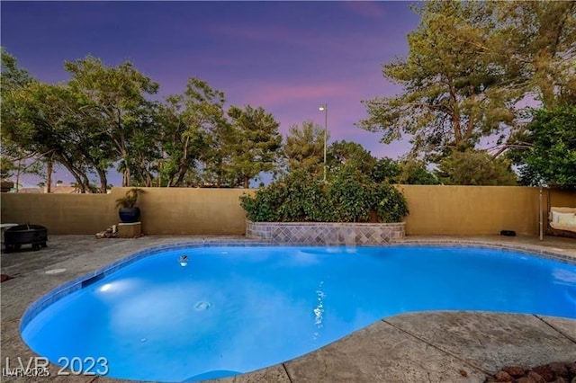 view of pool featuring a fenced in pool, a patio, and a fenced backyard