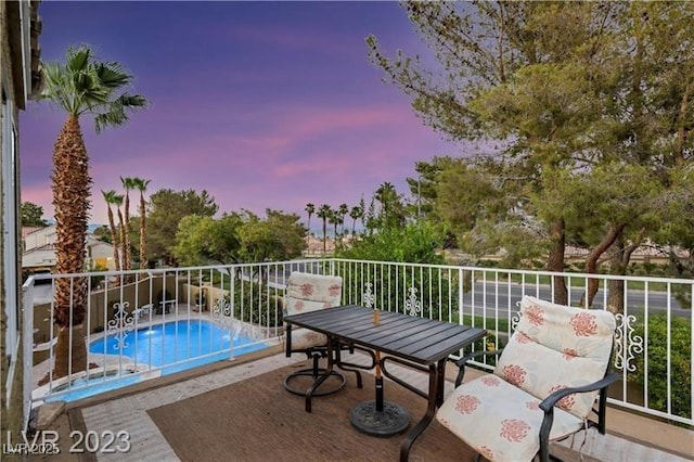 exterior space featuring a fenced in pool