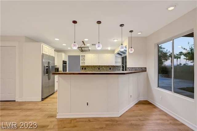 kitchen featuring open shelves, tasteful backsplash, a peninsula, stainless steel fridge with ice dispenser, and light wood finished floors