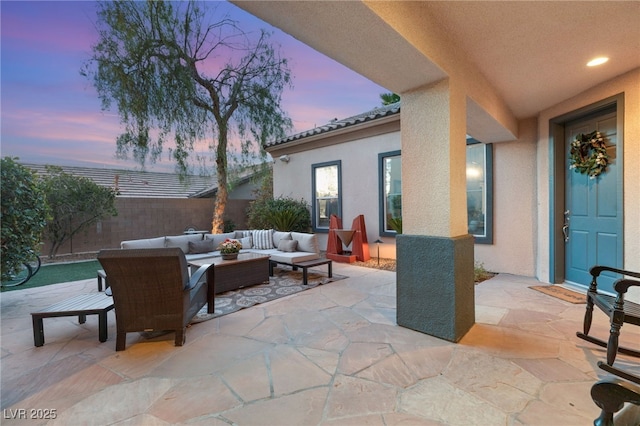 view of patio / terrace featuring fence and an outdoor hangout area