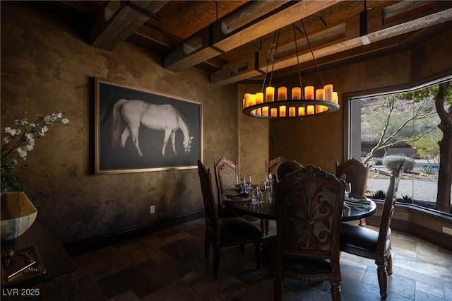 64 Promontory Ridge Dr, Las Vegas, NV 89135 - dining space with a chandelier, stone tile flooring, and beam ceiling