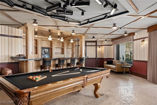 playroom with a community bar, billiards, and ornate columns