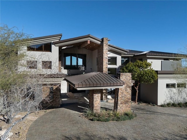 64 Promontory Ridge Dr, Las Vegas, NV 89135 - view of front of house with stucco siding