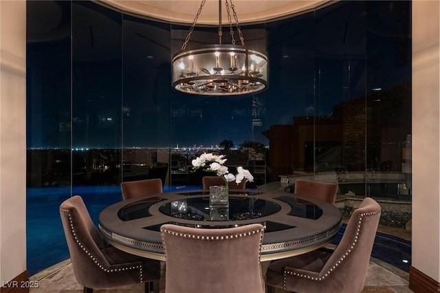 dining room featuring a chandelier