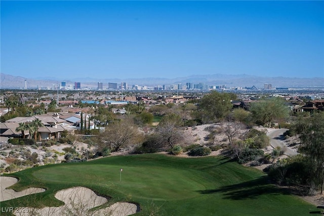 64 Promontory Ridge Dr, Las Vegas, NV 89135 - view of home's community with a view of city, golf course view, a putting green, and a mountain view