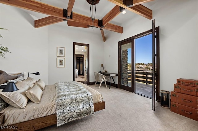 carpeted bedroom featuring baseboards, beam ceiling, and access to outside