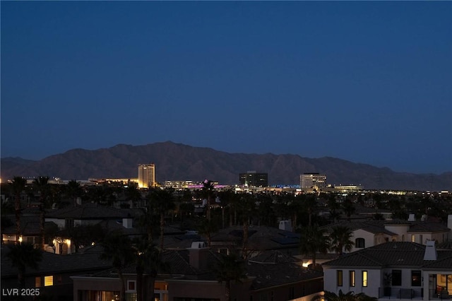 64 Promontory Ridge Dr, Las Vegas, NV 89135 - view of city featuring a mountain backdrop and a view of city lights