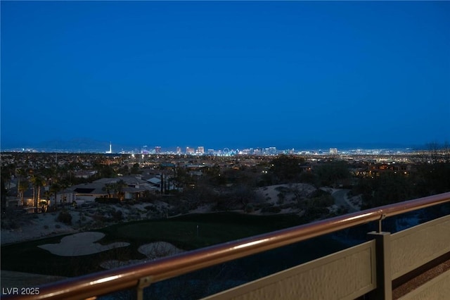 64 Promontory Ridge Dr, Las Vegas, NV 89135 - balcony at twilight featuring a view of city lights