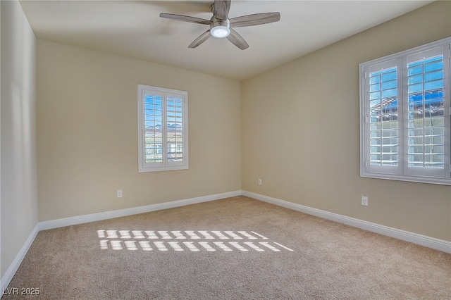 unfurnished room with baseboards, carpet floors, and ceiling fan