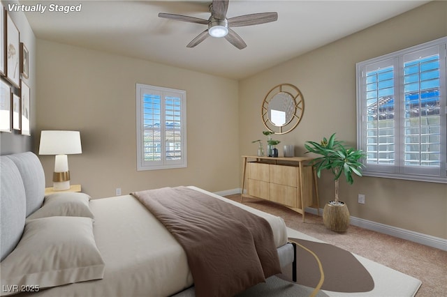 bedroom featuring carpet flooring, ceiling fan, and baseboards