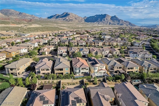 drone / aerial view featuring a mountain view and a residential view