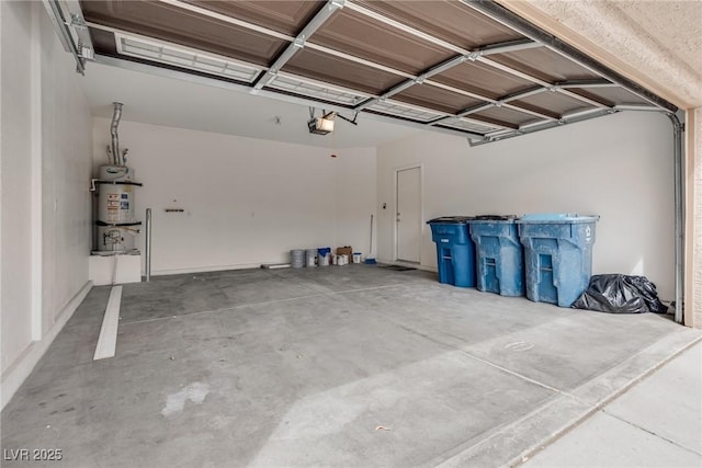 garage with a garage door opener and water heater