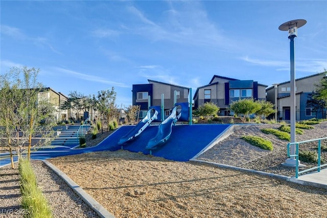 communal playground with a residential view